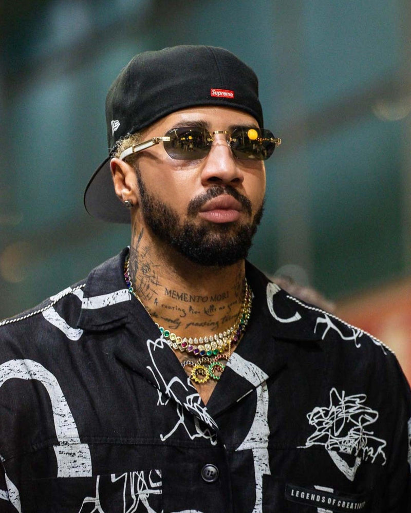 U.S. Olympian Miles Chamley Makes a Bold Statement at F1 Singapore Grand Prix in Legends of Creativity - Legends of Creativity