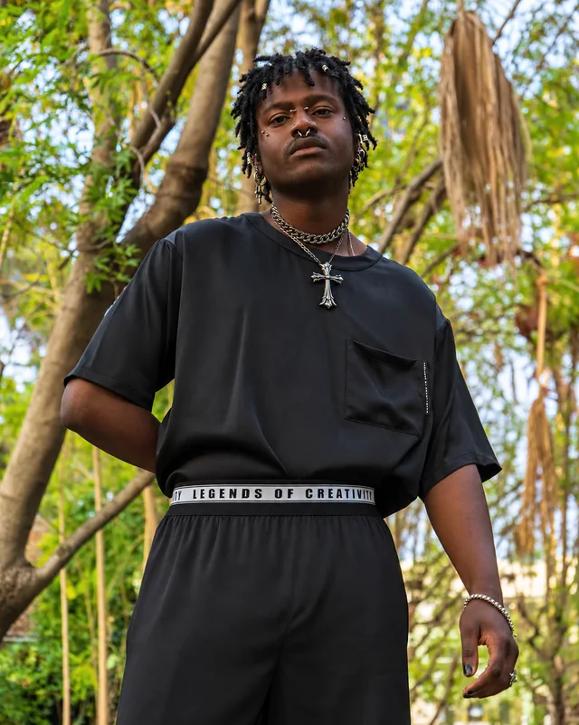Portrait of a model in a black silk outfit