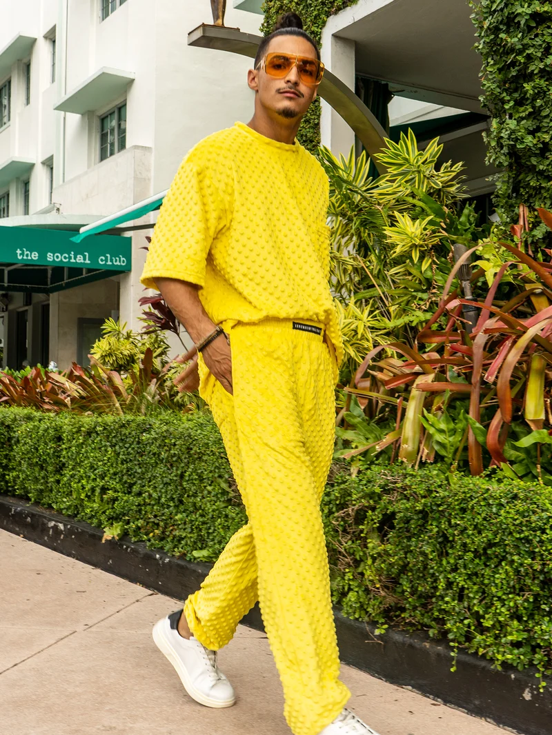 Man walking in a yellow textured set